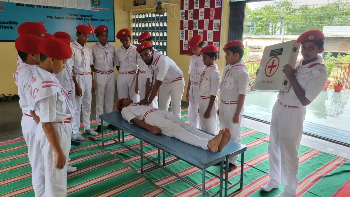 Scouts practising stretcher and first-aid drill