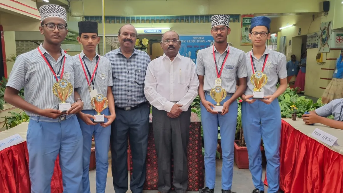 Students receiving trophies at a school prize presentation
